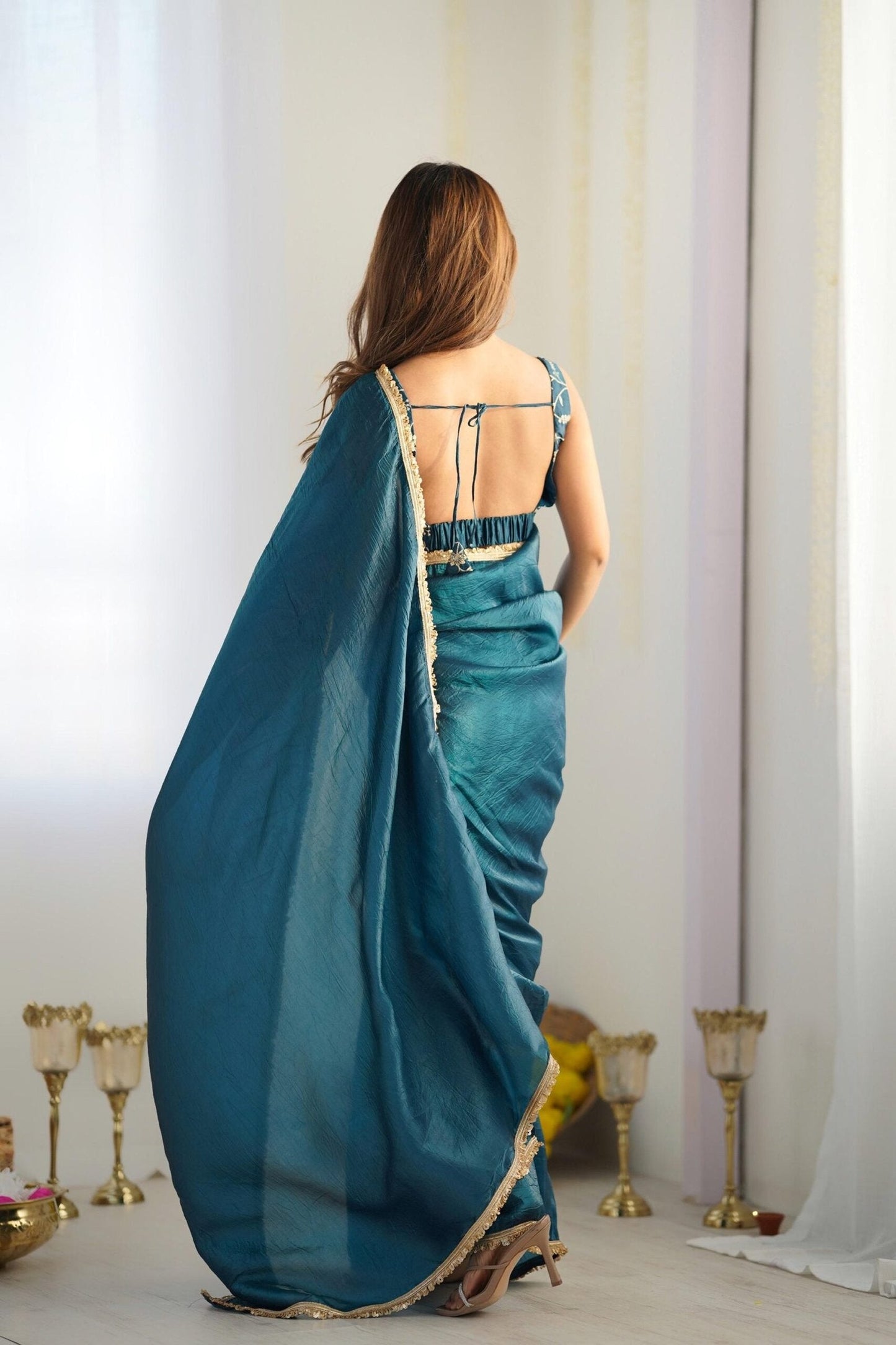 Luxurious Teal Blue Saree in Gold Crush Tissue Silk